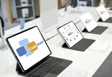 Tablets lined up on display at a shopping mall