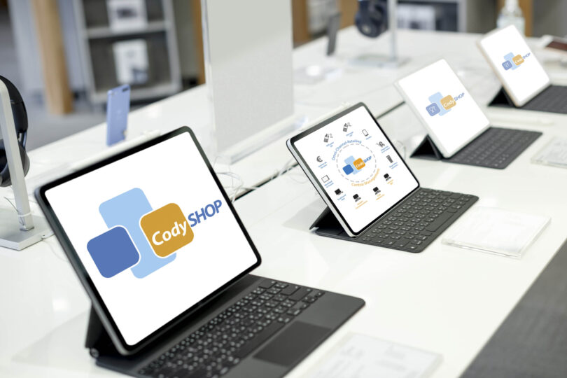 Tablets lined up on display at a shopping mall